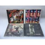 Three Foetus CDs signed by J G Thirlwell and 'Shrunken Man' by The The also signed by him (4).