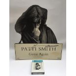 A signed Patti Smith standee plus a sealed 8 track