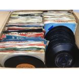 A box of 7inch singles from the 1960s/70s by vario