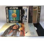 A collection of reggae LPs and 12inch singles comp
