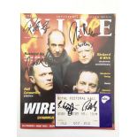 A signed copy of Wire magazine signed by the membe