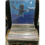 A box of rock LPs including Nirvana, Guns n Roses,