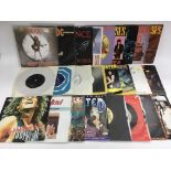 A collection of rock 7inch singles by various arti