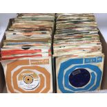 A box of 7inch singles of various 1960s artists an