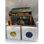 A box of rock n roll and rockabilly 7inch singles,