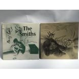 Two signed 12inch singles by The Smiths comprising