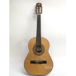 A child's Spanish guitar, comes supplied with a so