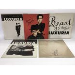 Five Luxuria vinyl records, four being signed by H