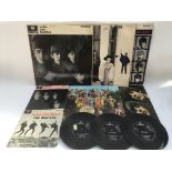 A collection of Beatles LPs, EPs and 7inch singles