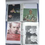 Four binders of signed photos and magazine covers