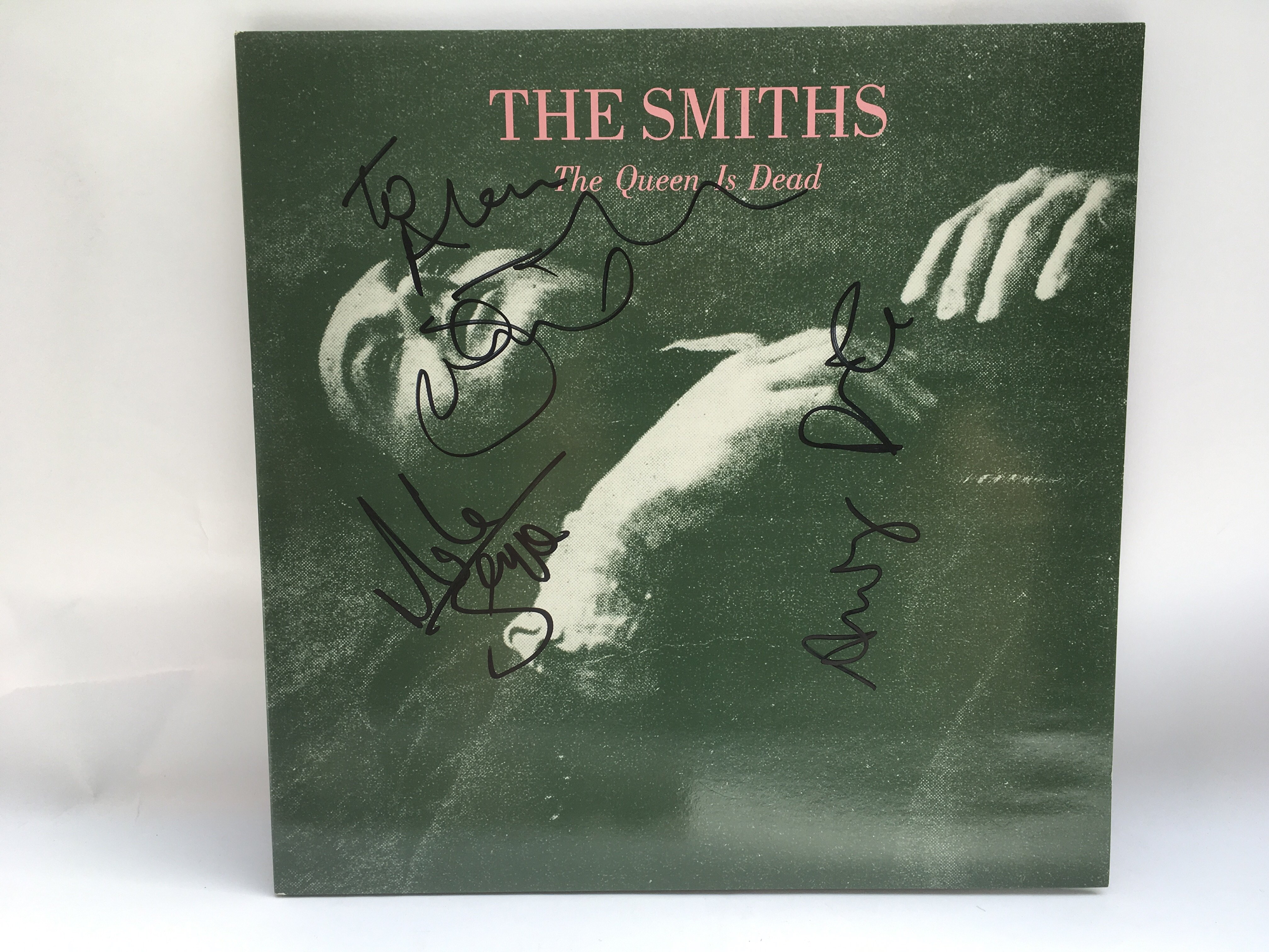 A signed 'The Queen Is Dead' LP by The Smiths, sig