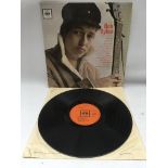 A 1964 pressing of Bob Dylan's debut LP. VG condition.