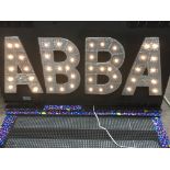 A light up illuminated 'Abba' sign, approx 60cm x