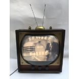 A custom built lamp in the form of an old TV set w