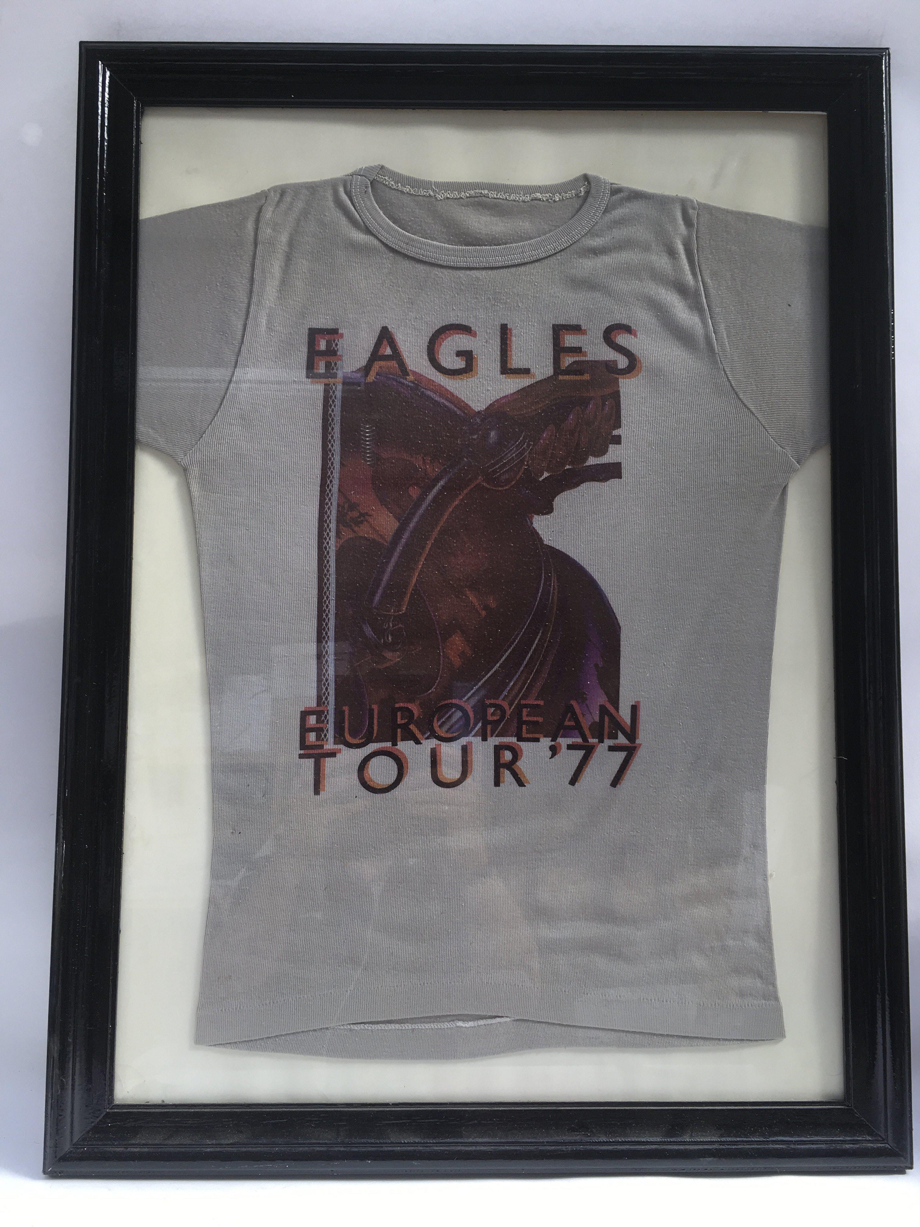A framed and glazed Eagles 1977 European tour t sh
