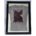 A framed and glazed Eagles 1977 European tour t sh