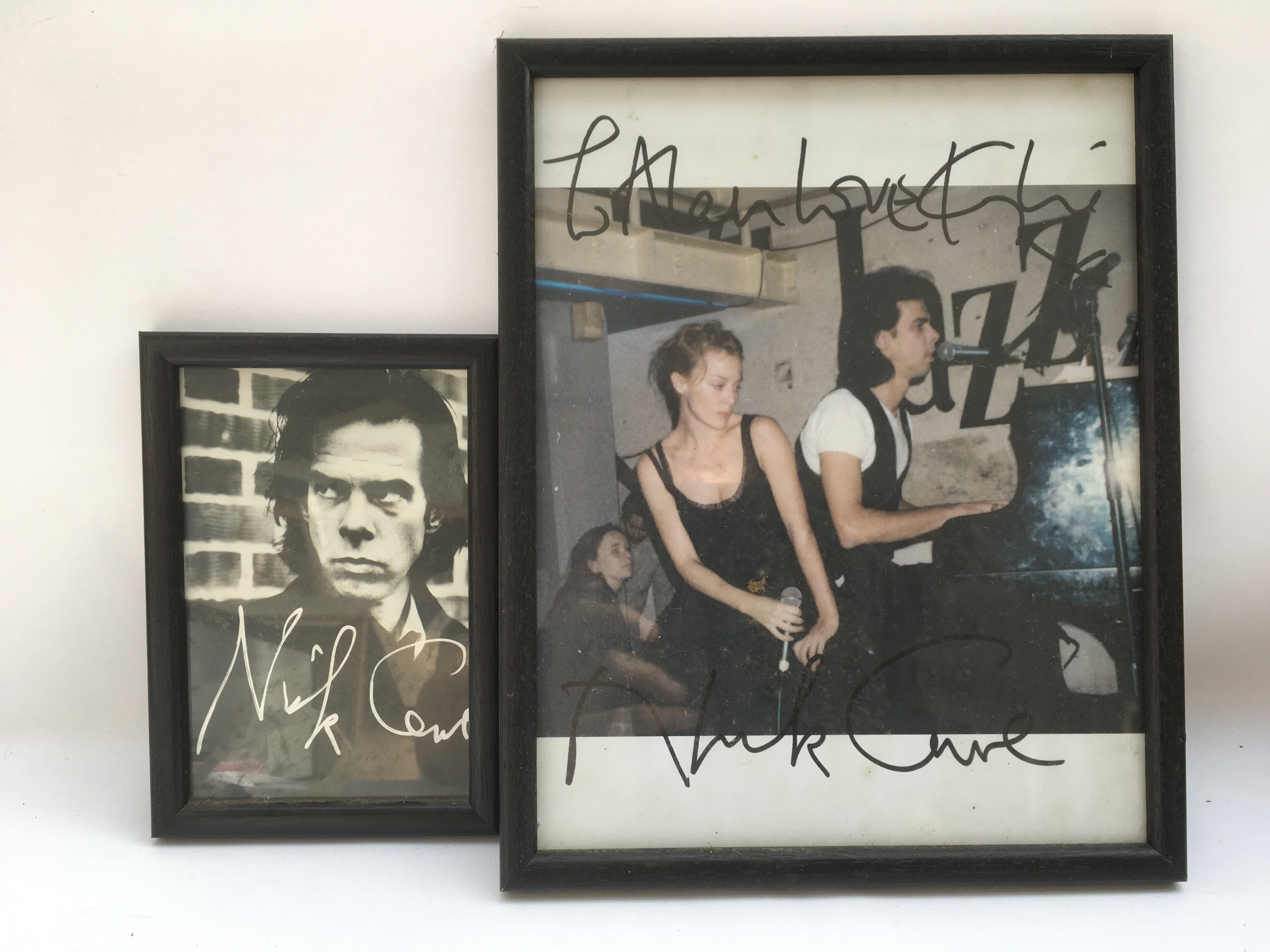 A signed photograph of Nick Cave and Kylie Minogue