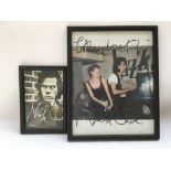 A signed photograph of Nick Cave and Kylie Minogue