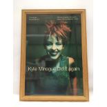 A framed and glazed signed poster of Kylie Minogue