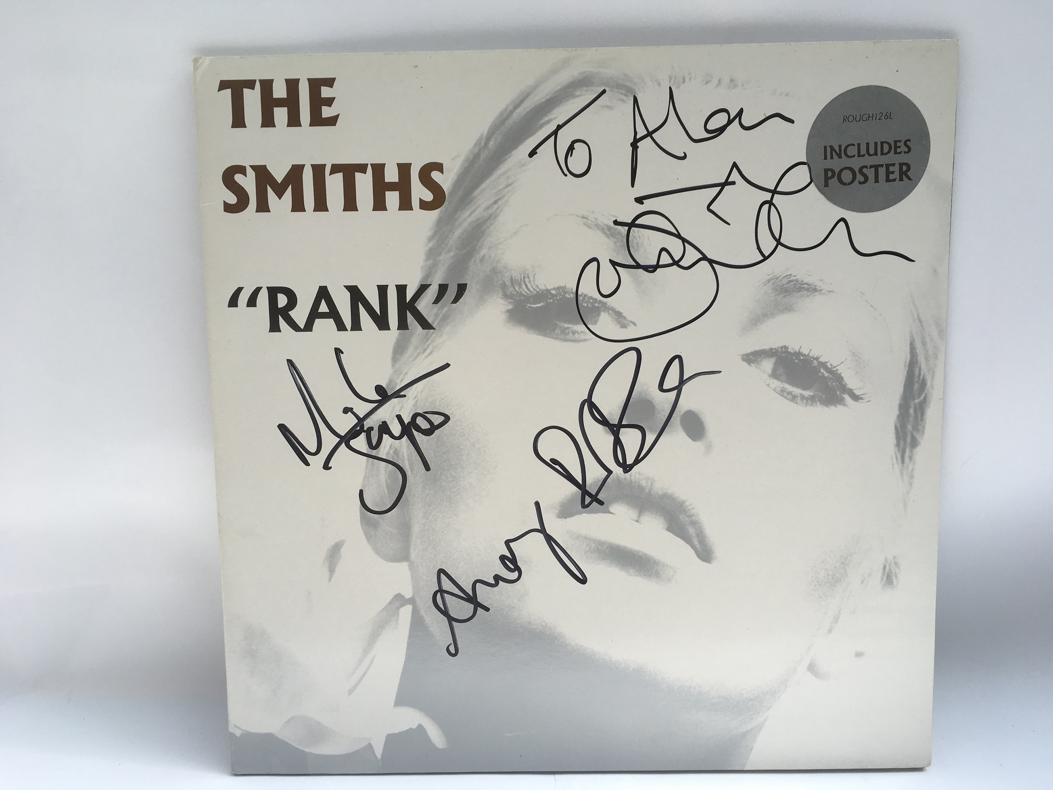 A signed 'Rank' LP by The Smiths, signed to the fr