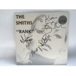 A signed 'Rank' LP by The Smiths, signed to the fr