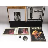 A collection of Patti Smith items including gig photos, an Arista Records promotional pack,