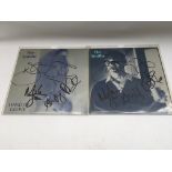 Two signed 7inch singles by The Smiths comprising