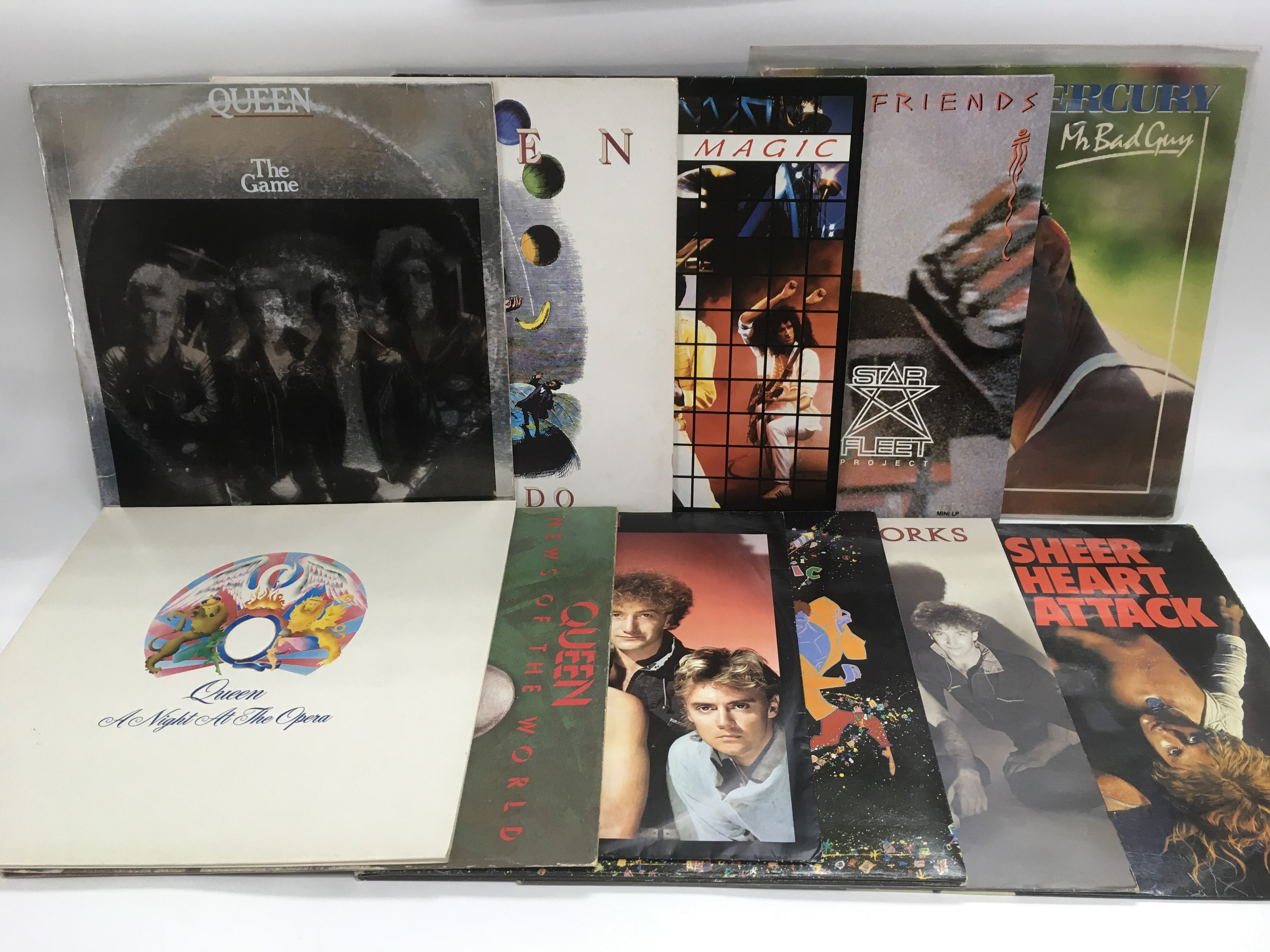 Eleven Queen and related LPs and 12inch singles in