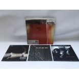 A signed Nine Inch Nails triple LP 'The Fragile',