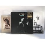 Three CD box sets comprising Elvis Presley, George