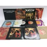 A collection of Queen and related 7inch singles in