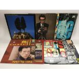 Seven Elvis Costello LPs and 12inch singles includ