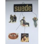 A rare Suede promo mobile display signed by Brett