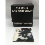 A Jesus And Mary Chain signed CD signed by Jim Reid plus a promotional cardboard stand for the 'Some