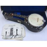 A George Formby maple wood ukelele banjo in fitted