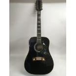 A Lorenzo 12 string acoustic guitar in black, no c