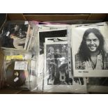 A box of music publicity photos and ephemera.