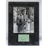 A genuine Norman Wisdom autograph mounted on board