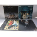 Four Abba LPs, three signed by Bjorn Ulvaeus.