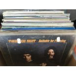 A box of LPs by various artists including Three Do