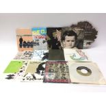 A collection of seven inch singles to include exam