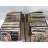 Two boxes of 7inch singles by various artists from