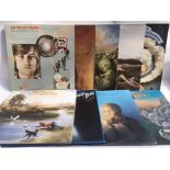 A collection of Moody Blues and related LPs.