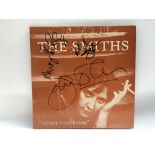 A signed 'Louder Than Bombs' LP by The Smiths, sig