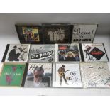 A collection of punk and post punk signed CDs including a Sex Pistols CD signed by Glen Matlock,