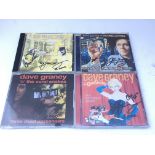 Four signed Dave Graney CDs.