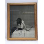 A framed and glazed signed poster of Patti Smith a