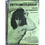 Four Patti Smith posters, one signed by Lenny Kaye