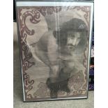 A framed Frank Zappa poster distributed by 'I was Lord Kitchener's valet', approx 51cm x 70cm (