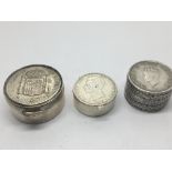 Three Silver boxes the tops inset with coins Diame